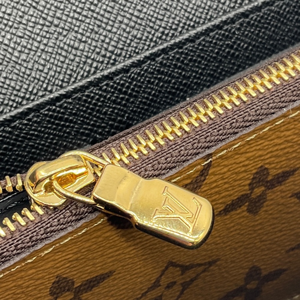 LOUIS VUITTON BROWN / TAN MONOGRAM CANVAS SARAH WALLET - Picture 14 of 15